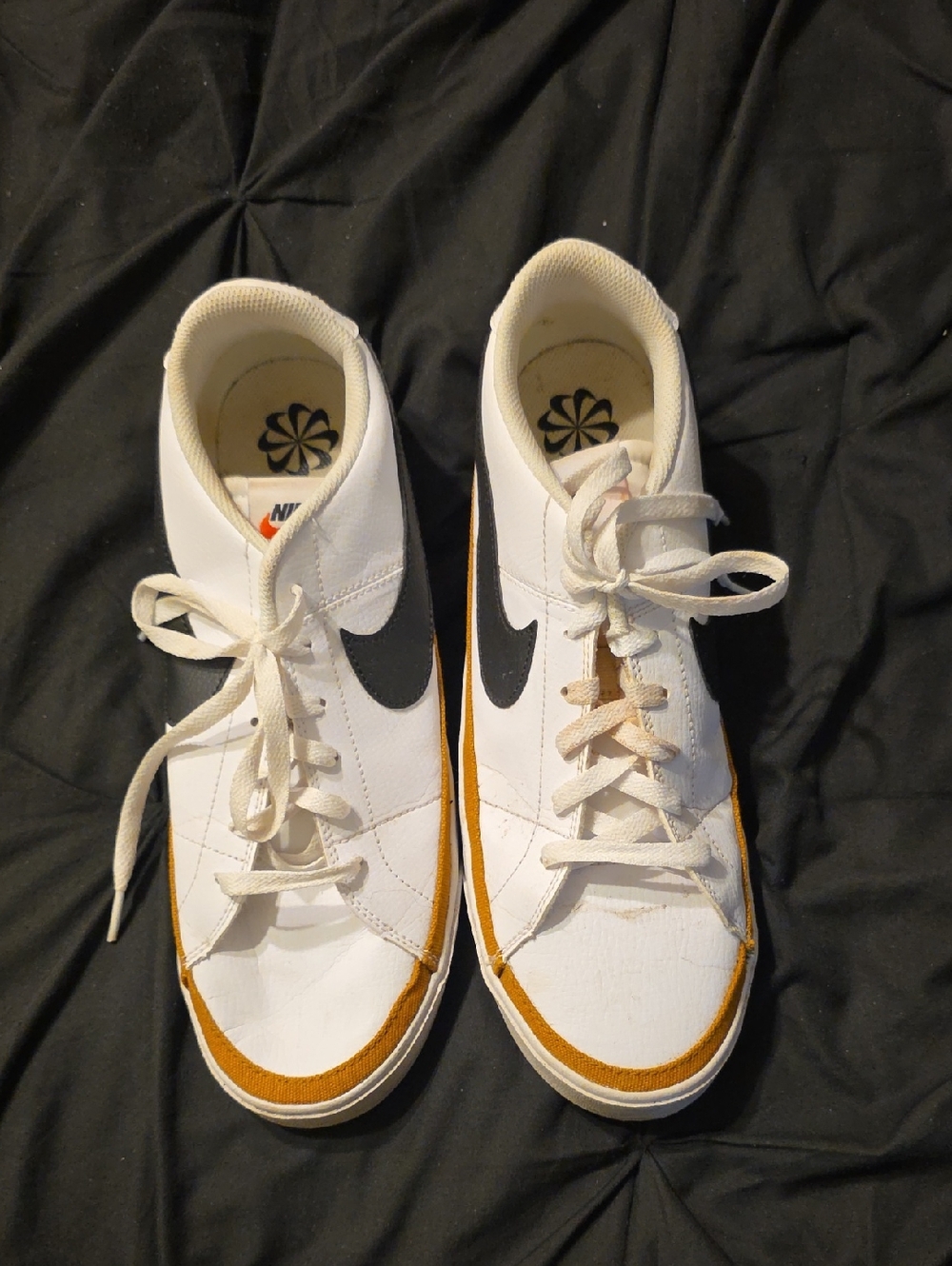 Nike White High-Top Sneakers with Black Swoosh and Tan Accent